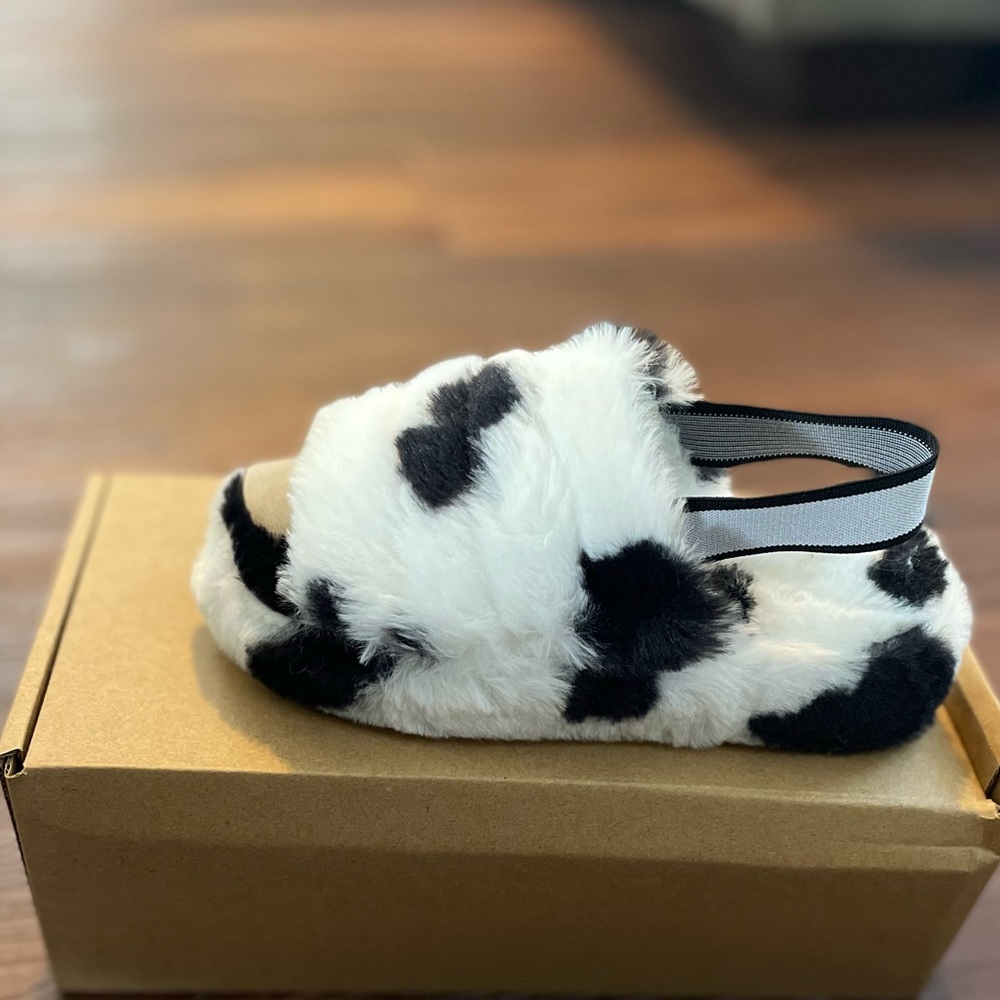 Cow print kid slides
